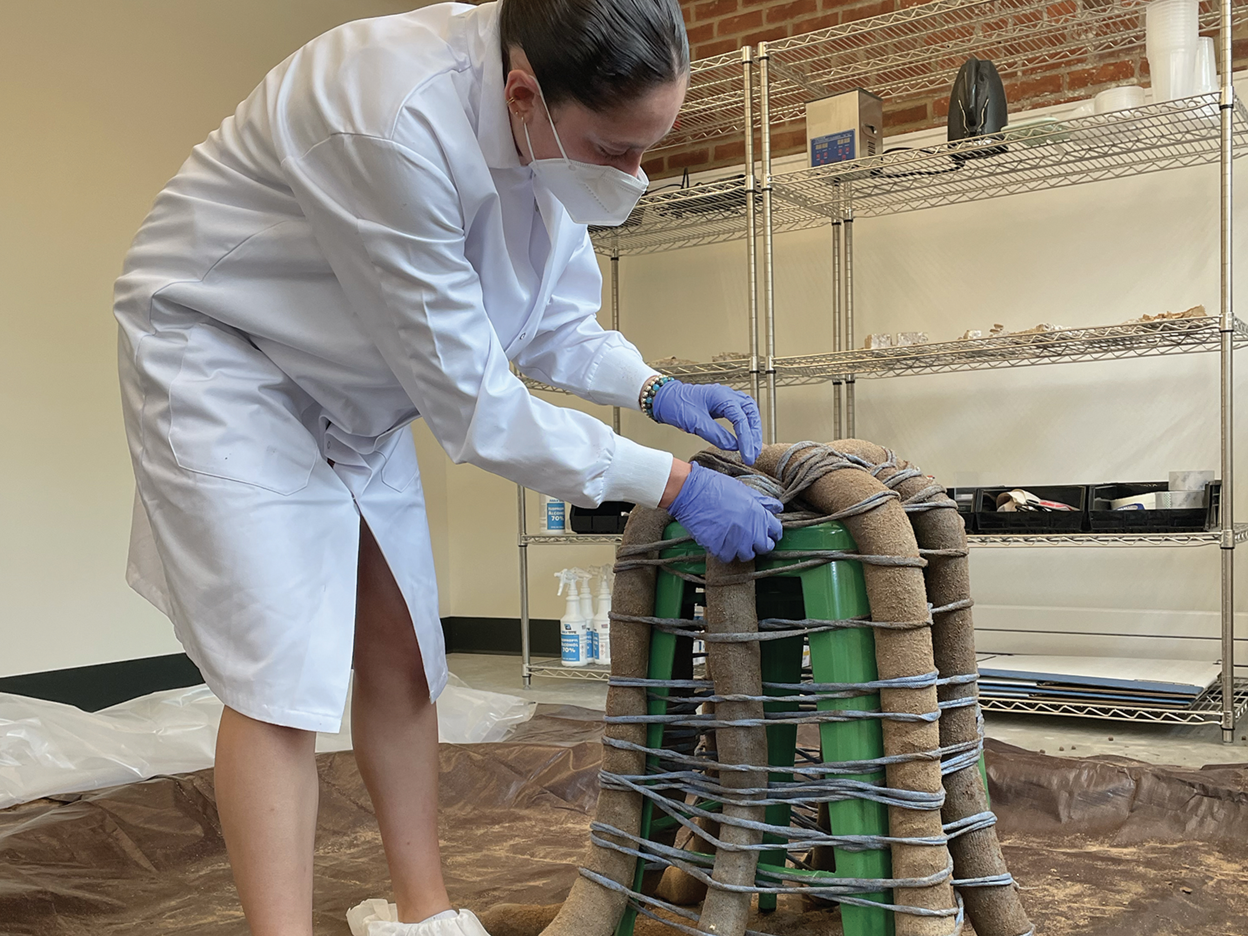 researcher checking tubing