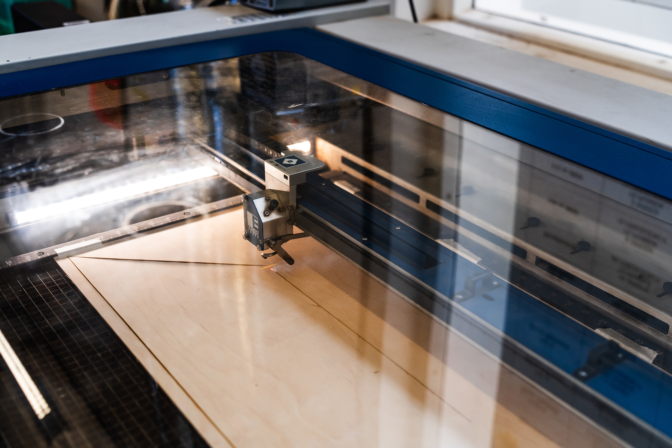 laser cutter cutting wood