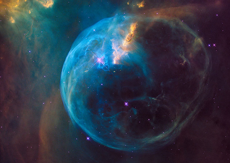 An enormous bubble being blown into space by a super-hot, massive star