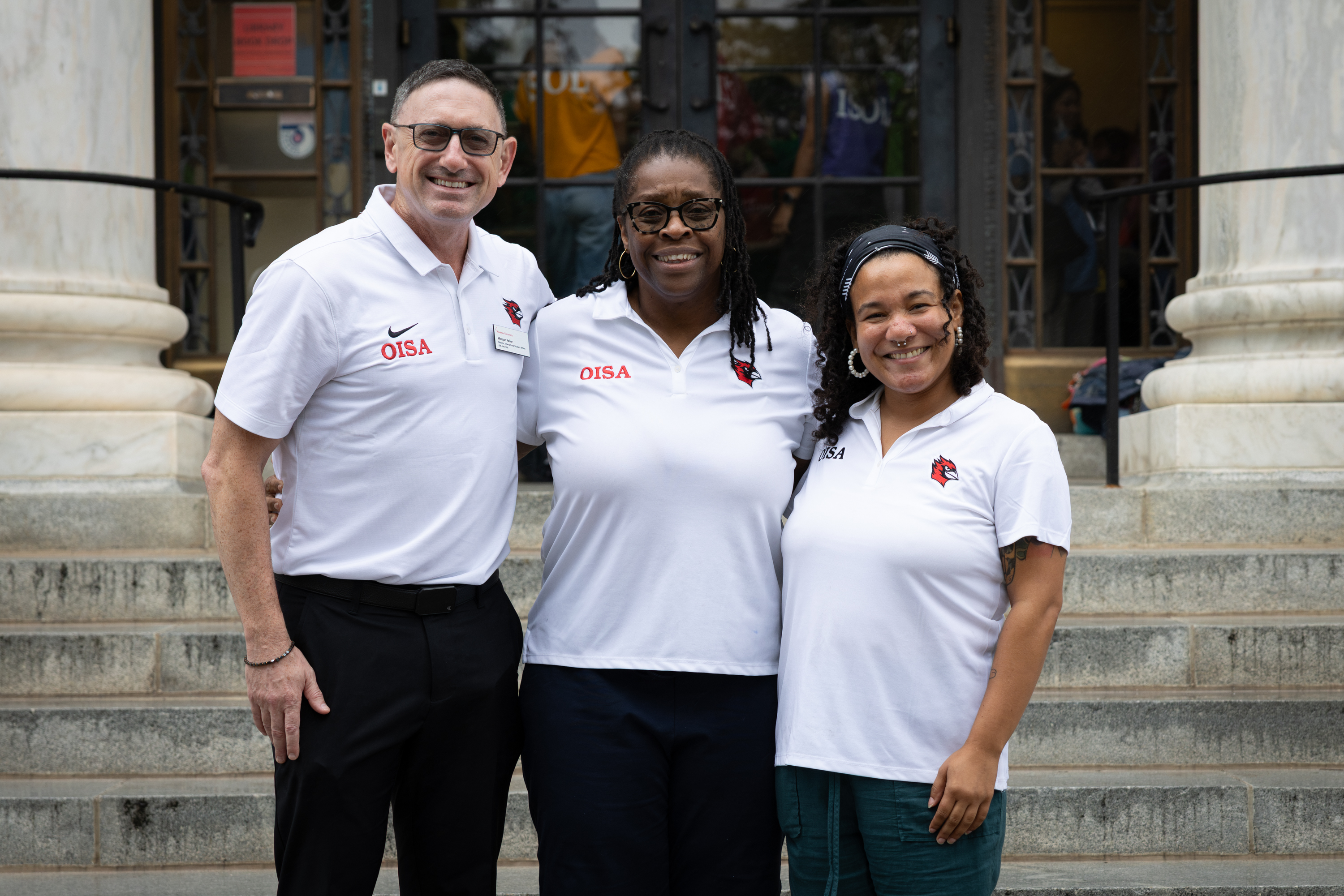 Group photo of 3 OISA staff members