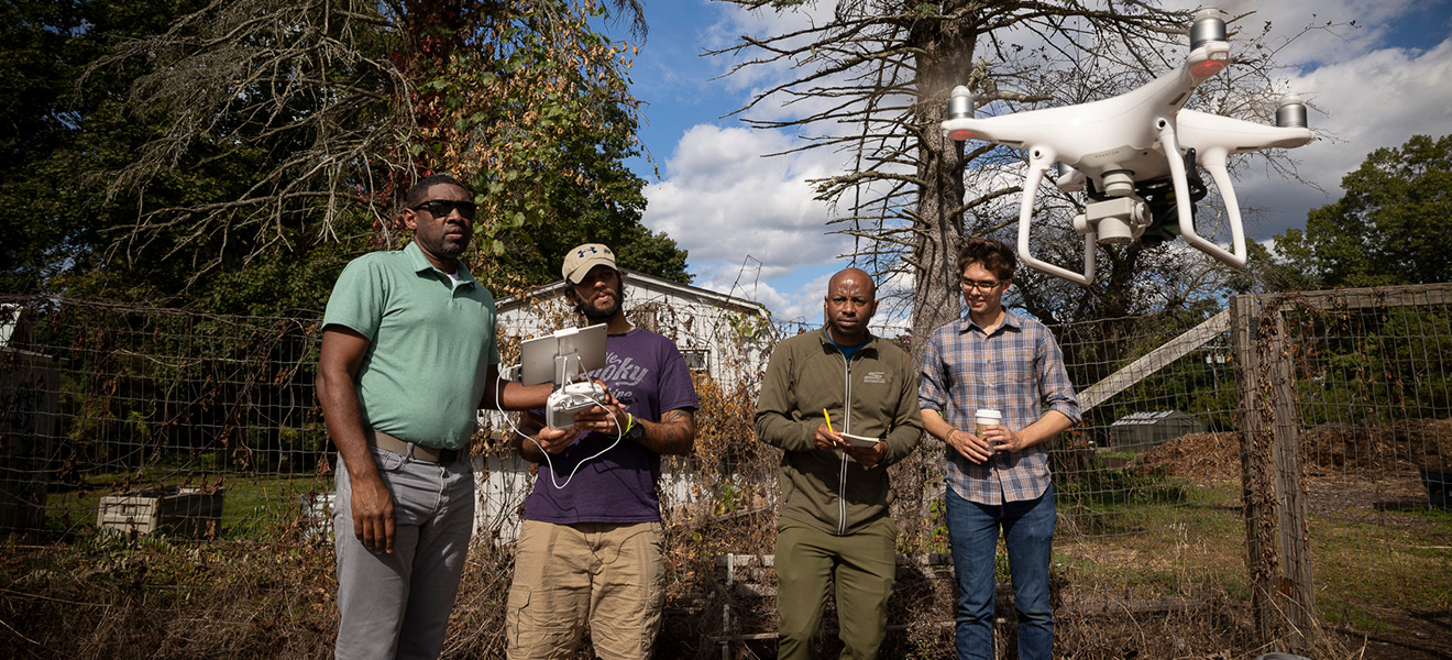 people flying a drone